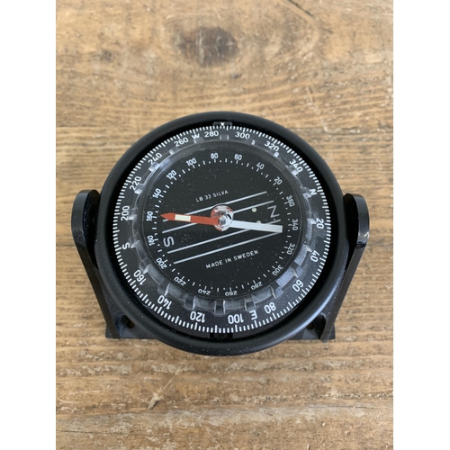 62 - A boxed 'Silva Marine 33' boat compass