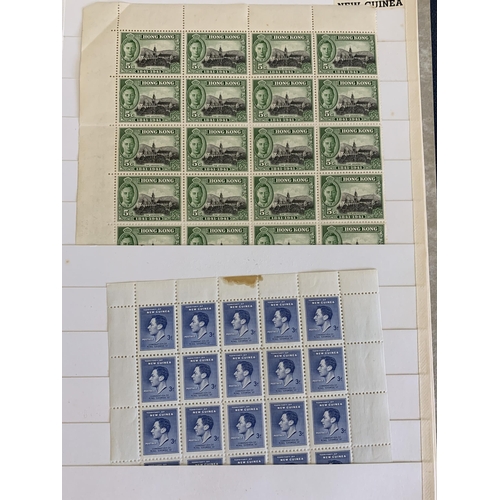 76 - Two albums of mid century world stamps, some as singles, many in part sheets