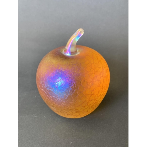 81 - A John Ditchfield iridescent gold glass form apple with label to base, approx. 3 1/2