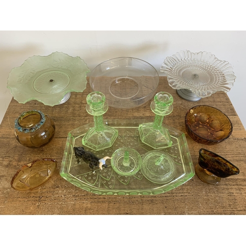 89 - Various coloured glass items including two cake stands, dressing table set etc