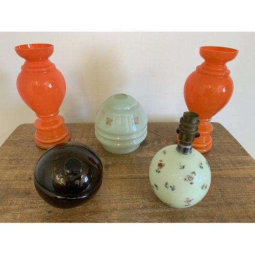 92 - A pair of vintage hand blown over painted orange vases, 10 1/4