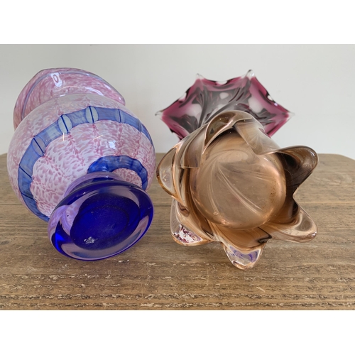 93 - A blue and pink glass vase, 7