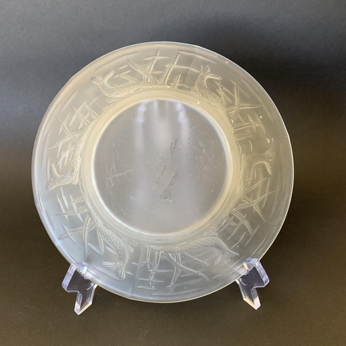 98 - An ornate moulded glass bowl decorated with fish, 8 1/4