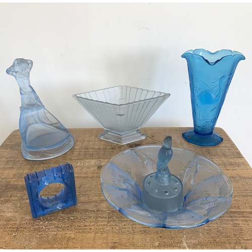 88 - A selection of blue glass items including a large stork vase, 10