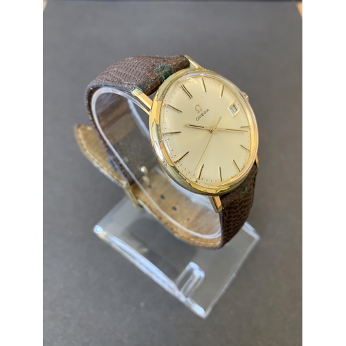 119 - A vintage Omega gents wristwatch (wear to outer case and possible back replacement)