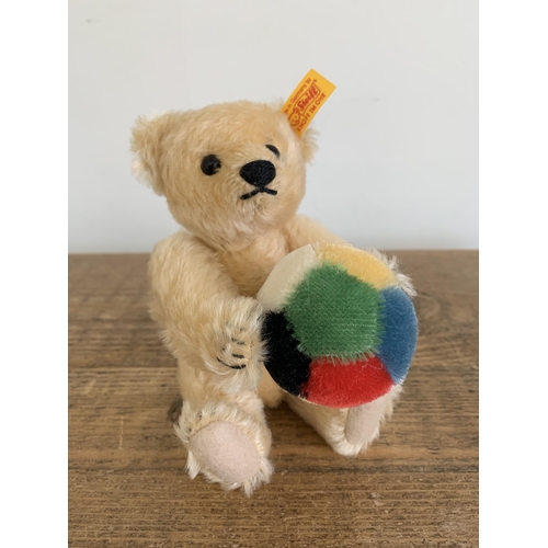 47 - Three Steiff teddy bears, a light blond with ball, approx. height 8