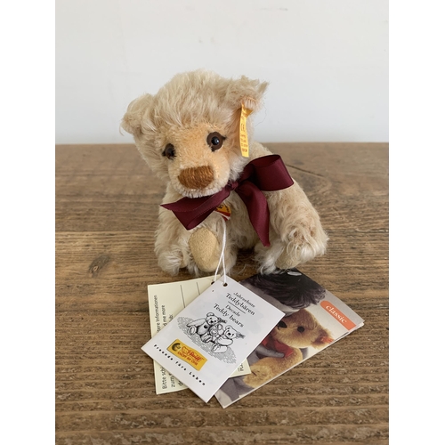 47 - Three Steiff teddy bears, a light blond with ball, approx. height 8