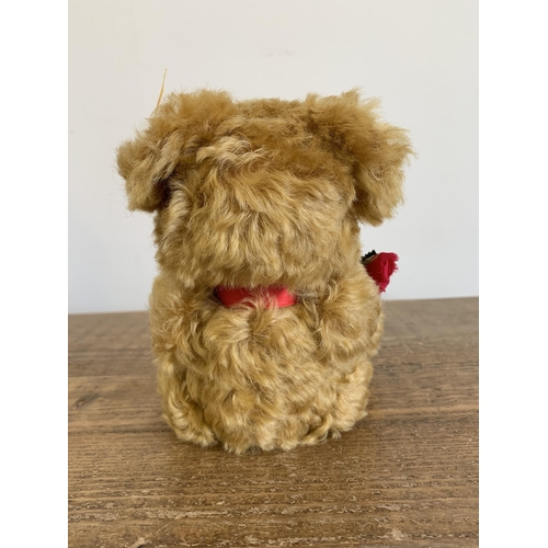 49 - A boxed Steiff teddy bear with rose 'I Love You', approx. height 8 1/2