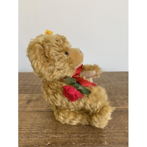 49 - A boxed Steiff teddy bear with rose 'I Love You', approx. height 8 1/2