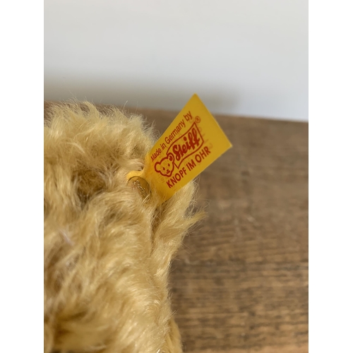 49 - A boxed Steiff teddy bear with rose 'I Love You', approx. height 8 1/2