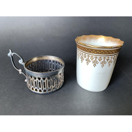 100 - A hallmarked silver cup holder with an Aynsley china cup plus a pair of 800 grade silver swan salts