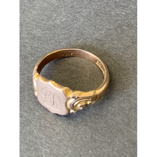 120 - A 375 rose gold shield shape ring, engraved initials to centre, approx. size W, weight approx. 7.2g