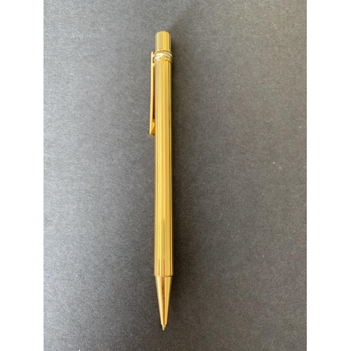 150 - A vintage 'Must De' Cartier gold plated propelling pencil, just over 5 1/4