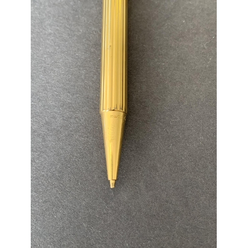 150 - A vintage 'Must De' Cartier gold plated propelling pencil, just over 5 1/4