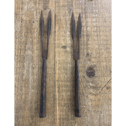 179 - Two fishing spears (possibly tribal), 16