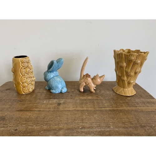 18 - Four items of Sylvac including a rabbit, cat and vases