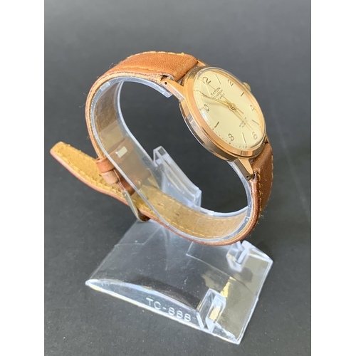 181 - A vintage 1940-1960's Tatton of Edinburgh wristwatch on brown leather strap, dia 32mm (running at th... 