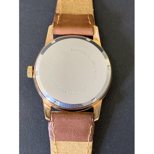 181 - A vintage 1940-1960's Tatton of Edinburgh wristwatch on brown leather strap, dia 32mm (running at th... 