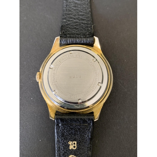 188 - A vintage Mudu automatic wristwatch on black leather strap, 32mm dia (running at the time of lotting... 