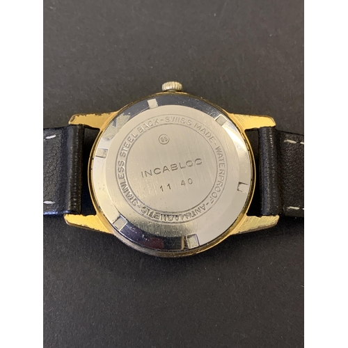 198 - A vintage Bucherer wristwatch, gold plated G10 case, on black leather strap, 32mm dia (running at th... 