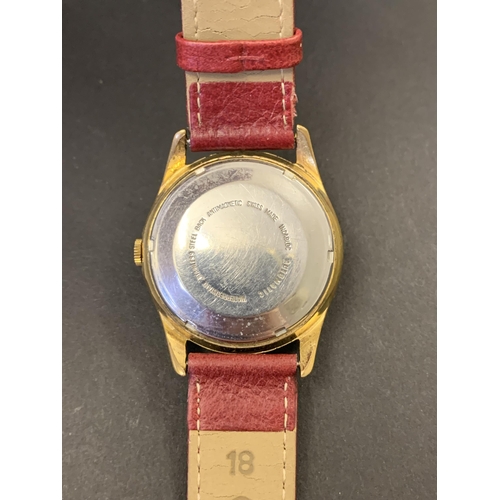 201 - A vintage Garrard Automatic wristwatch, rolled gold G10, on red leather strap, 32mm dia (running at ... 