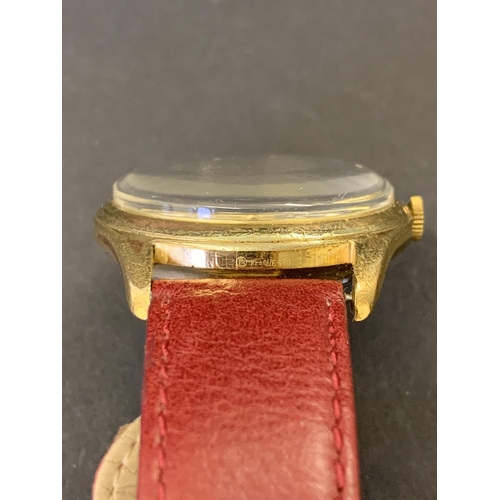 201 - A vintage Garrard Automatic wristwatch, rolled gold G10, on red leather strap, 32mm dia (running at ... 