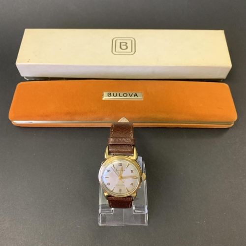 206 - A vintage boxed Bulova self-winding wristwatch on brown leather strap, 30mm dia (minor scuffs on cry... 