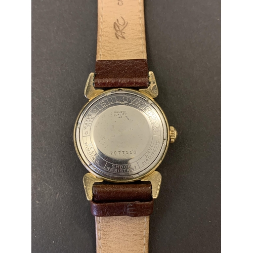 206 - A vintage boxed Bulova self-winding wristwatch on brown leather strap, 30mm dia (minor scuffs on cry... 