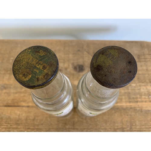 231 - A pair of vintage BP 'Energol' motor oil glass bottles