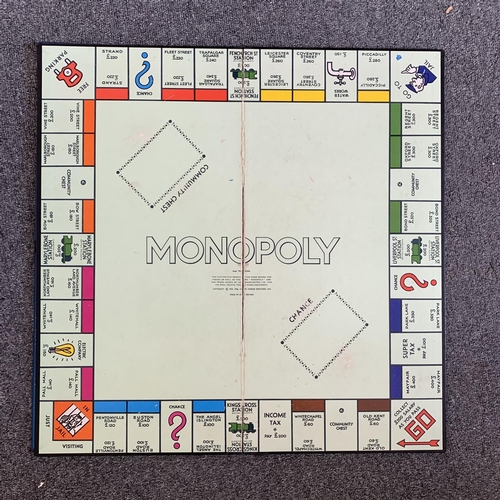 73 - A vintage 1969 Waddingtons Blast-Off game plus Monopoly, Buccaneer etc (all have been used but are i... 