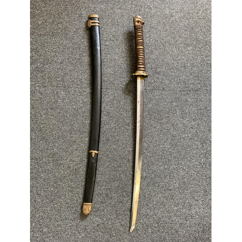 335 - A WW2 Japanese Katana in scabbard (possible rebound handle, ring loop missing on scabbard)