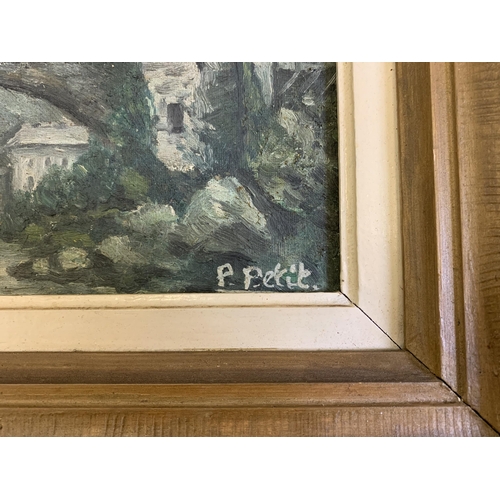 345 - A small framed oil on board of a bridge with houses scene, signed lower right P Petit (possibly Paul... 