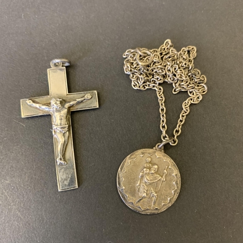 105 - A 925 sterling silver St Christopher on 925 chain plus a hallmarked silver cross, total weight appro... 