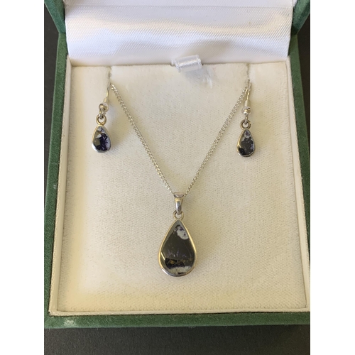 106 - A boxed Leslie David 925 sterling silver and Blue John stone set pendant with matching earrings