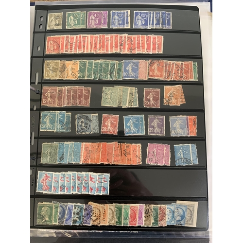 182 - A mixed lot of vintage world postage stamps in a lever arch file