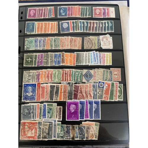 182 - A mixed lot of vintage world postage stamps in a lever arch file