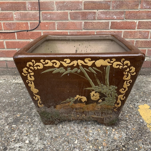 198 - A heavy large garden planter decorated on each side with  different Oriental animals, 21