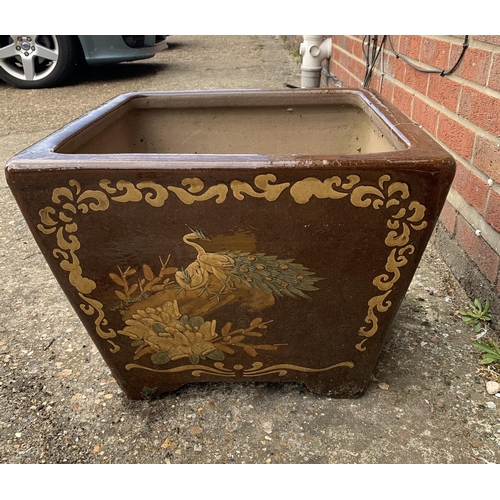 198 - A heavy large garden planter decorated on each side with  different Oriental animals, 21