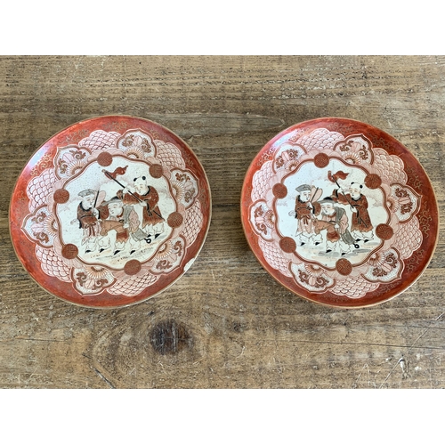 205 - A pair of antique Japanese Kutani hand painted plates with Oriental character marks to the back, app... 