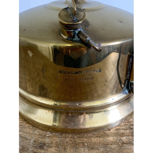 209 - An early 20th Century Swedish brass 'Aktiebolaget Optimus' kerosene lamp, 14