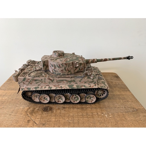 21 - A very heavy metal constructed Mato Toys MA1020 radio controlled Tiger tank, home hand painted in ca... 