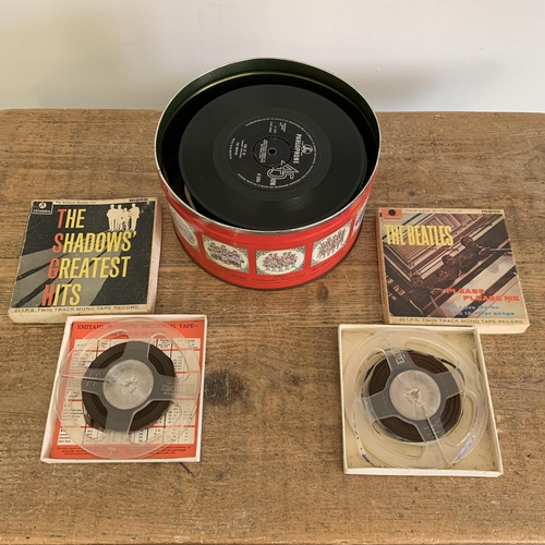 211 - A tin of vintage 45 singles, 1960's to 1980 including five Beatles plus two mono twin track cine tap... 