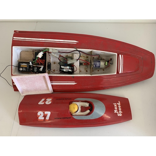 24 - A vintage plastic 'Varioprop Expert' speedboat, battery operated, hull contains electronics together... 