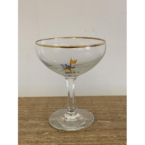 259 - Six vintage Babycham glasses plus a collection of small animal figures including Wade Whimsies