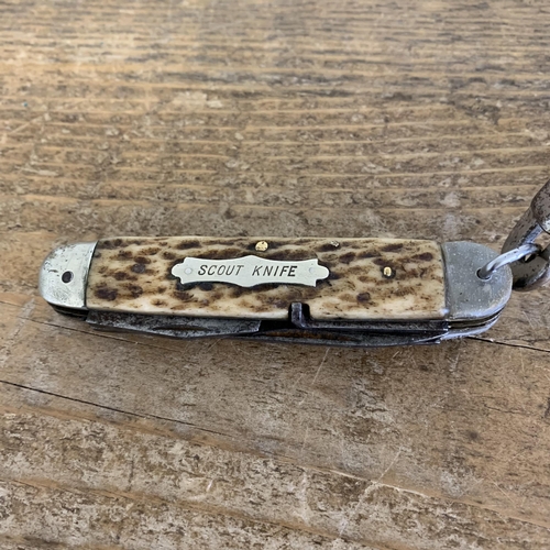 284 - A vintage Boys Scouts leather belt and buckle marked 'Be Prepared' with attached 'scout knife', mult... 