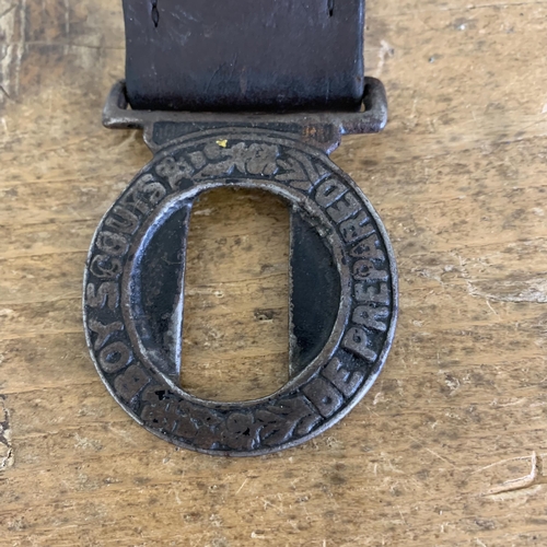 284 - A vintage Boys Scouts leather belt and buckle marked 'Be Prepared' with attached 'scout knife', mult... 