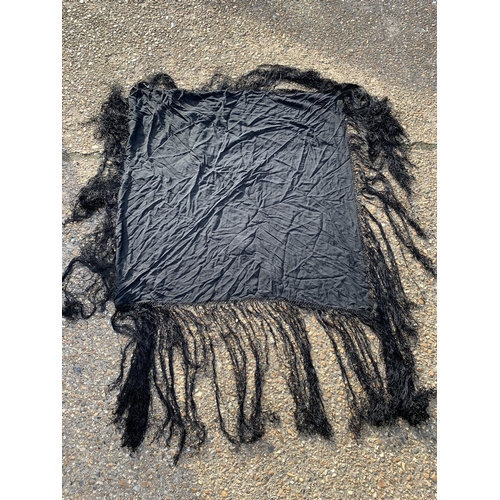 287 - An antique black silk mourning shawl, 48