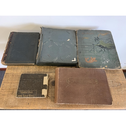 292 - Two early 20th Century postcard albums and contents together with a 'scraps' album, a small photogra... 