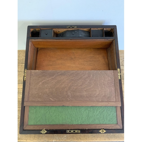 302 - A large brass banded mahogany writing/travelling box, interior with replacement leather, 17 1/2