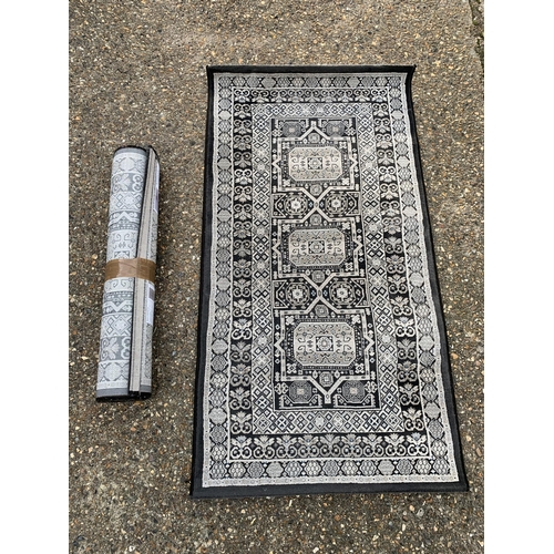 308 - Two Belgian floor rugs, 80cm x 150cm